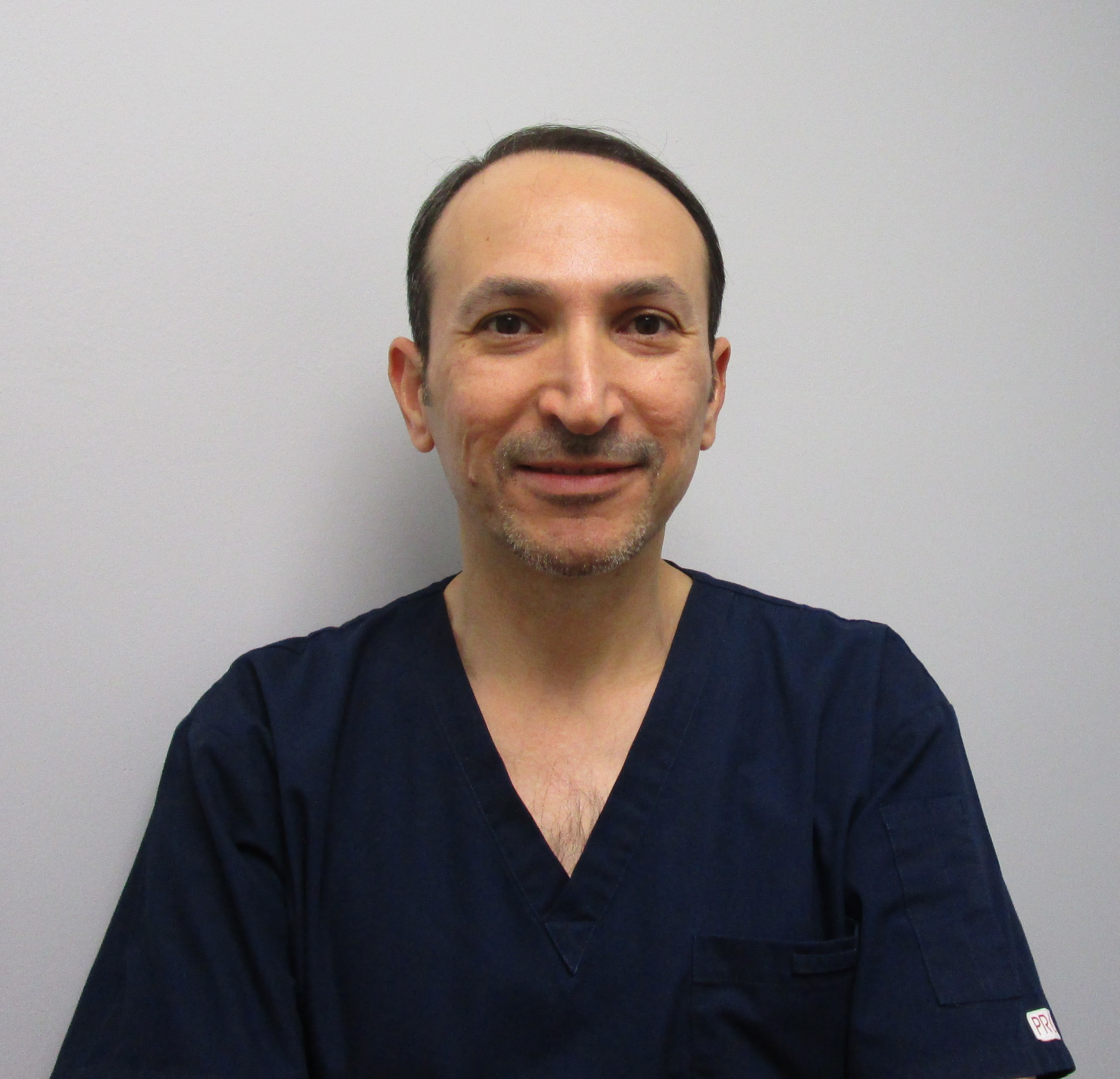 Dr. Tharwat Izzi